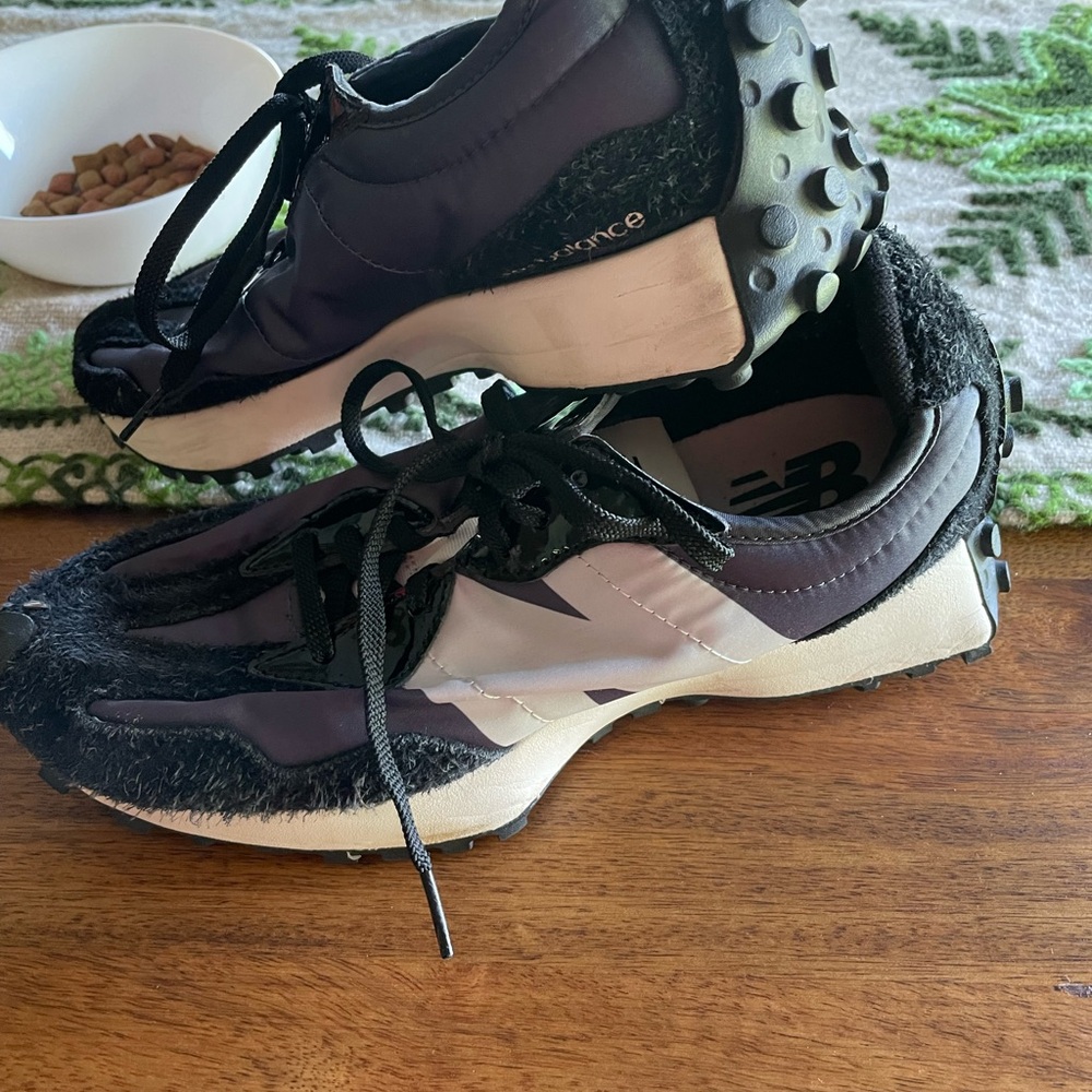 Black New Balance 327 in size 8